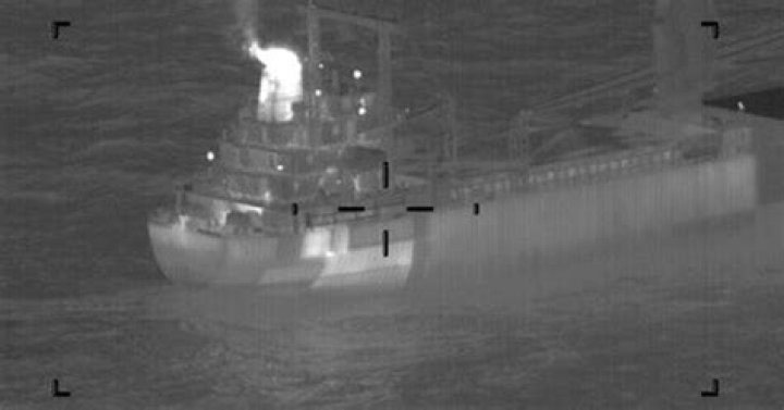 Cargo ship carrying burning lithium-ion batteries kept offshore of Alaska port