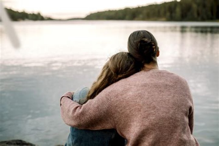 Mother sparks fury after telling daughter to stop cuddling her